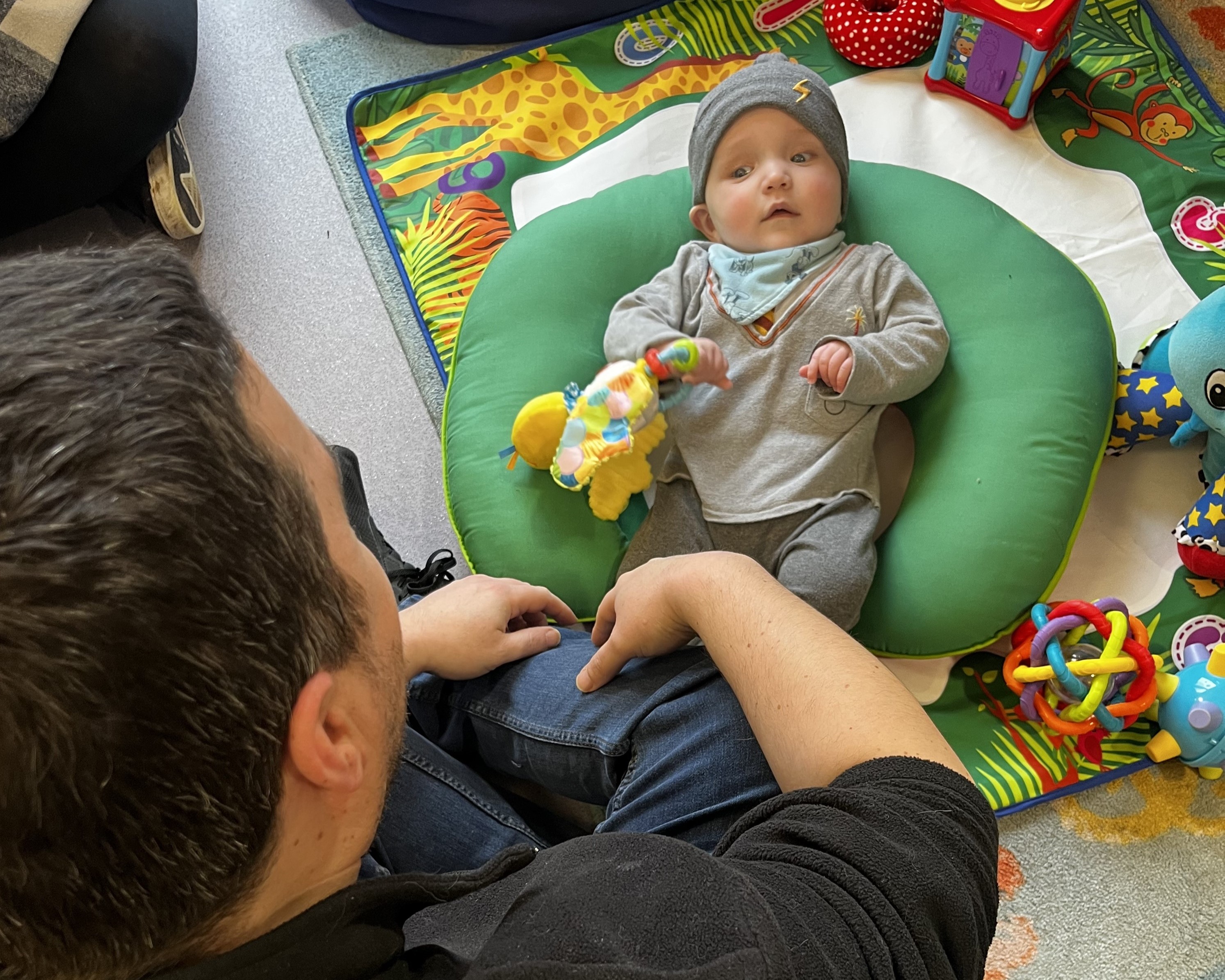 dad and baby playing