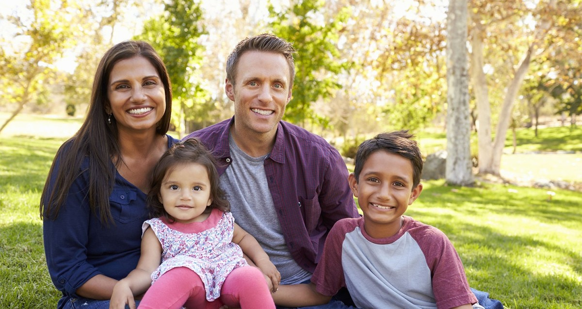 Family sat in the park