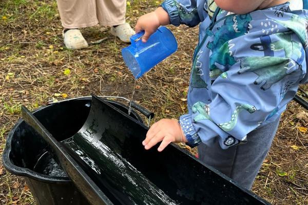 boy playing in water